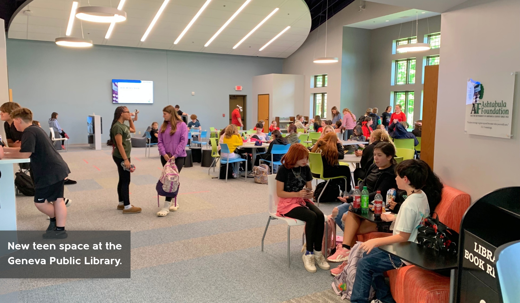 Teenagers enjoying the new space at the library