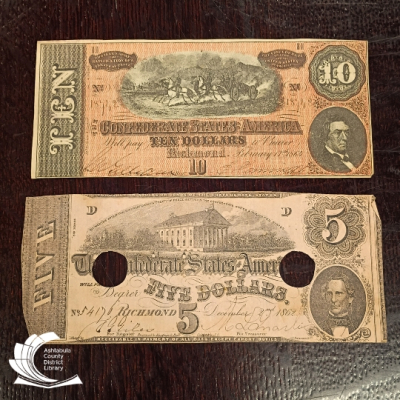 Two Confederate notes: a ten dollar and five dollar bill.