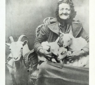 Old photo of Eliza Humphrey with her goats