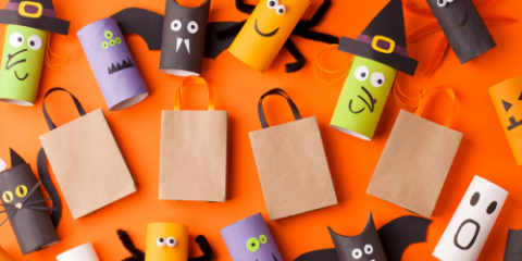 halloween paper crafts on an orange background