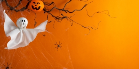 spooky crafts on an orange background