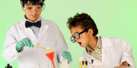 teen boys acting like scientists