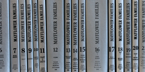 bookcase of silver Mayflower books